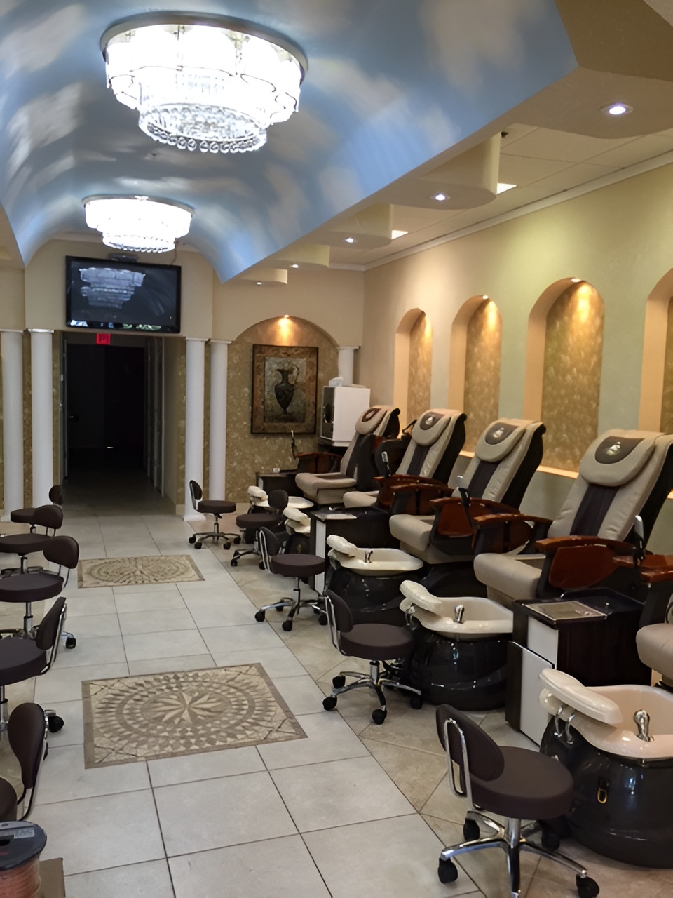 Luxury pedicure stations with elegant chandeliers